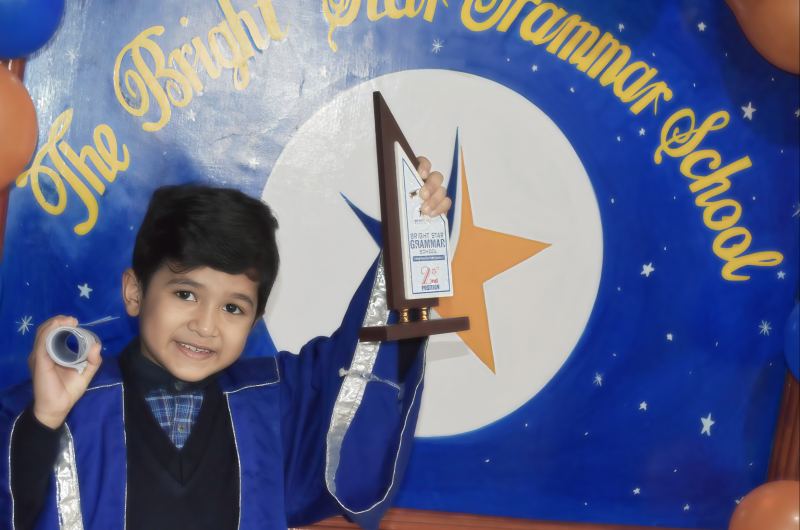 Student receiving a trophy