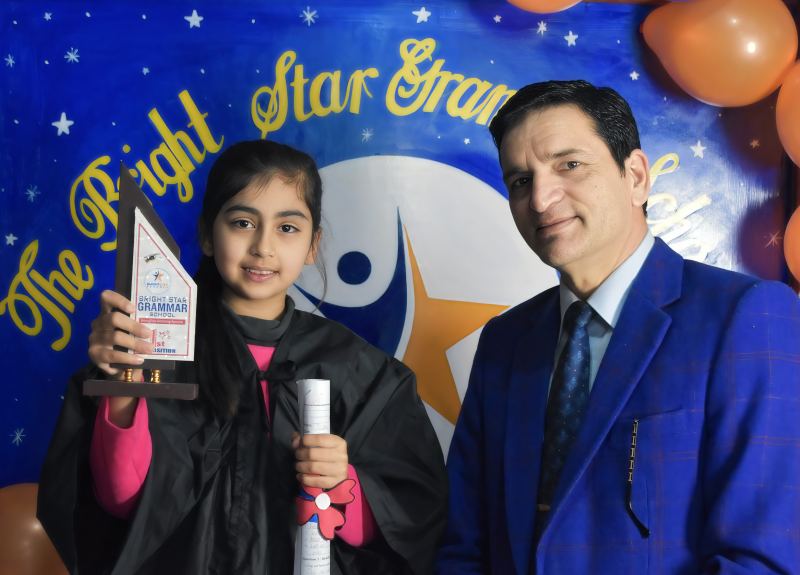 Student receiving her award